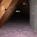 A room with pink and white insulation in it